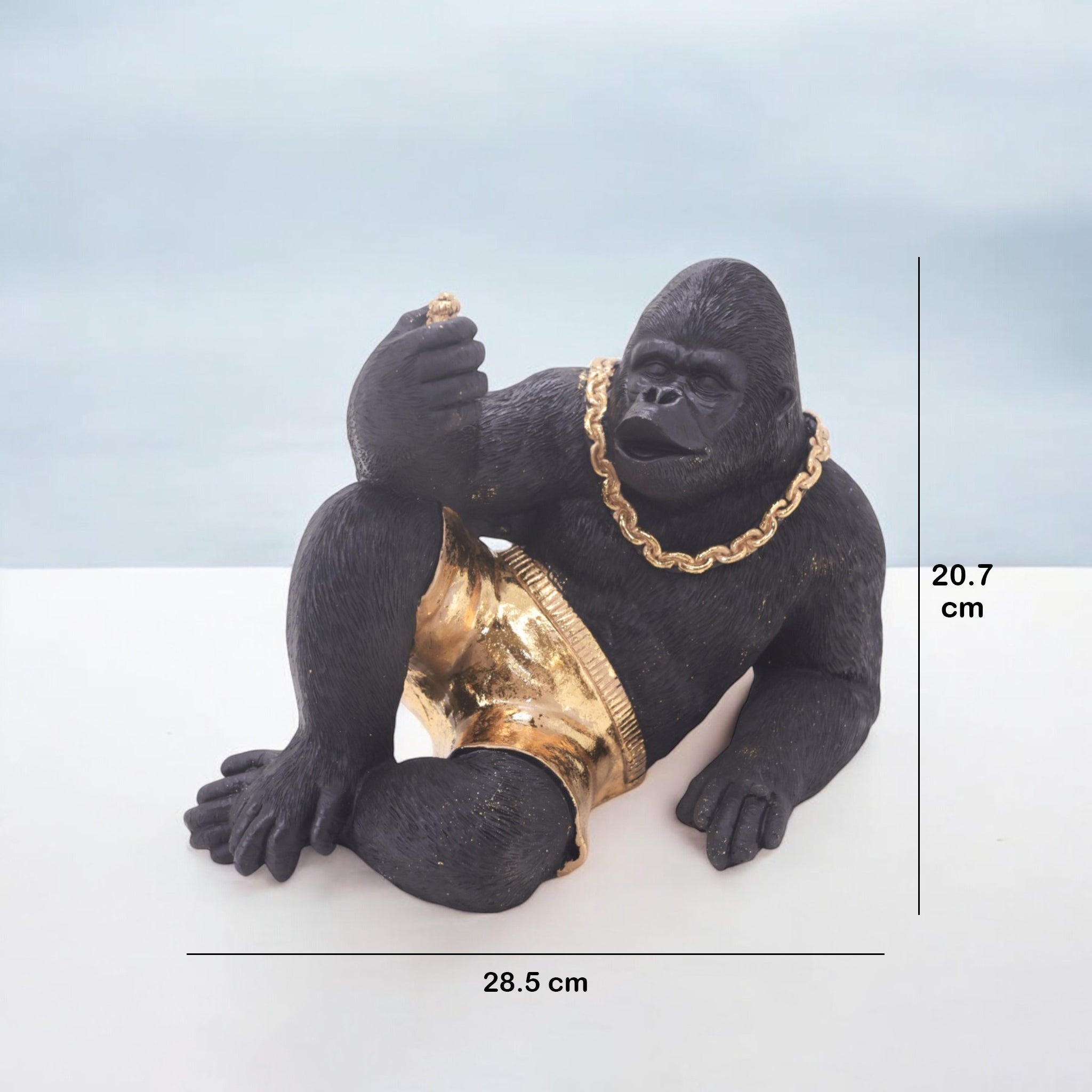 Modern Lounging Gorilla Sculpture | Black & Gold Urban Art Statue | 28.5cm Contemporary Home Decor - Divine Dekor