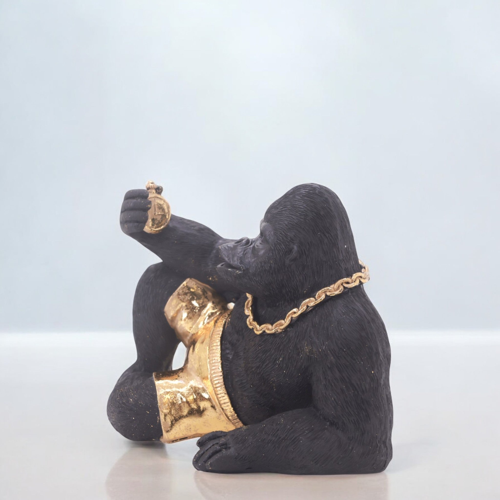 Modern Lounging Gorilla Sculpture | Black & Gold Urban Art Statue | 28.5cm Contemporary Home Decor - Divine Dekor